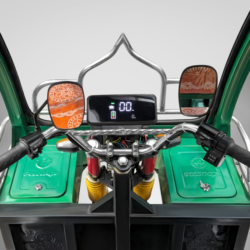 Modern digital dashboard of Borak auto rickshaw with battery indicator