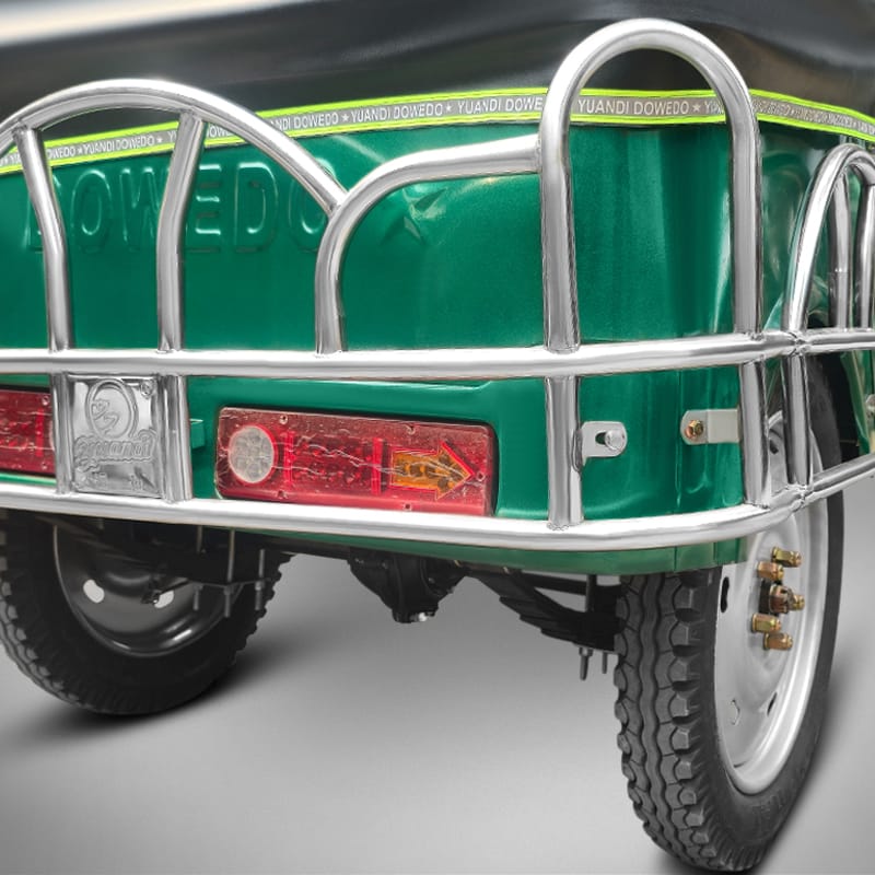 Rear view of Borak auto rickshaw showing tail lights and chrome bumper.